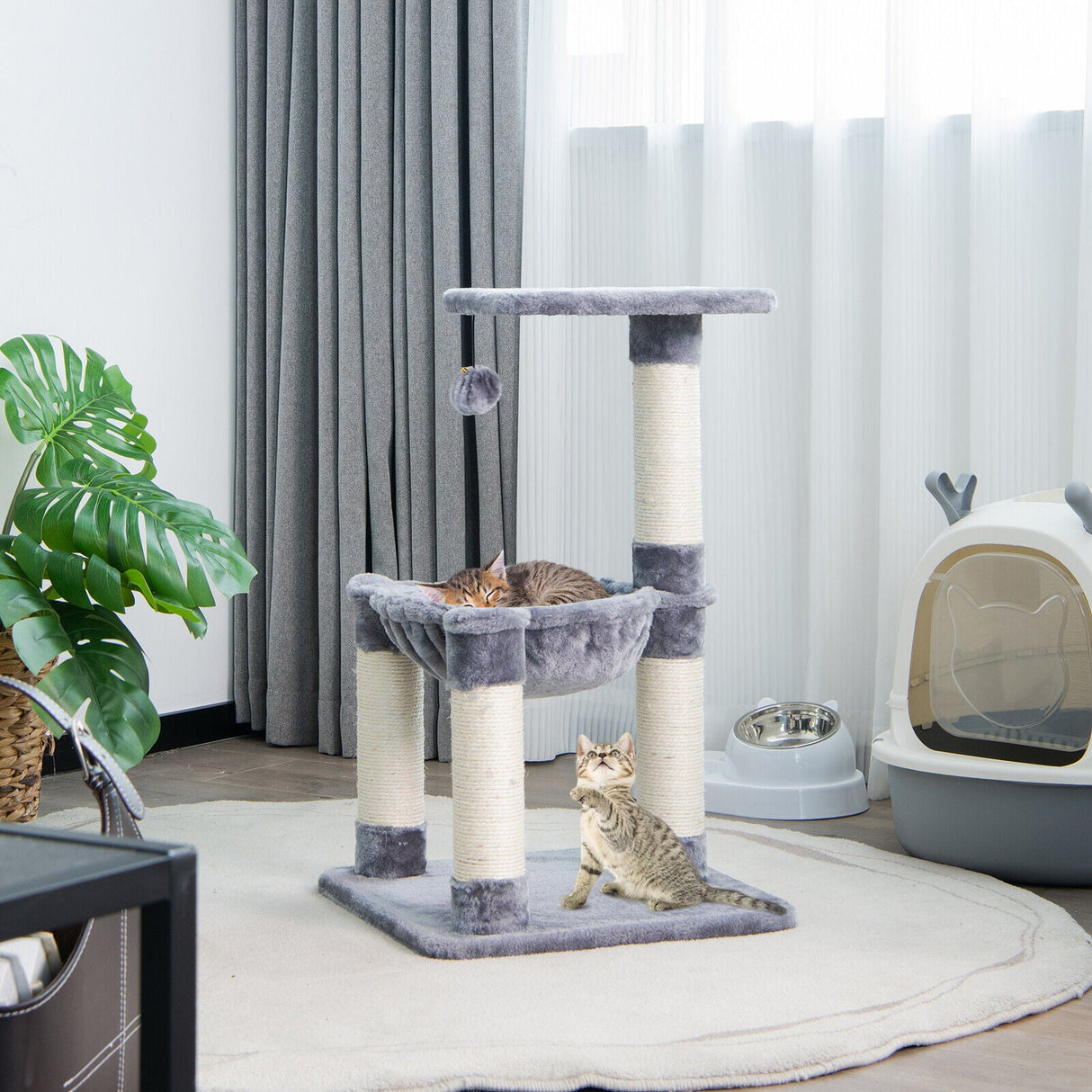 Árbol rascador multinivel con postes rascadores y hamaca para gatos