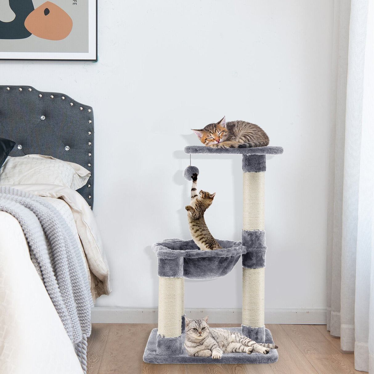 Árbol rascador multinivel con postes rascadores y hamaca para gatos