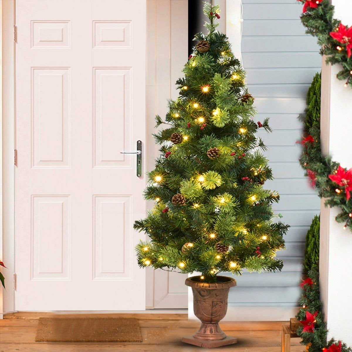 Árbol de Navidad LED con bayas rojas y piñas