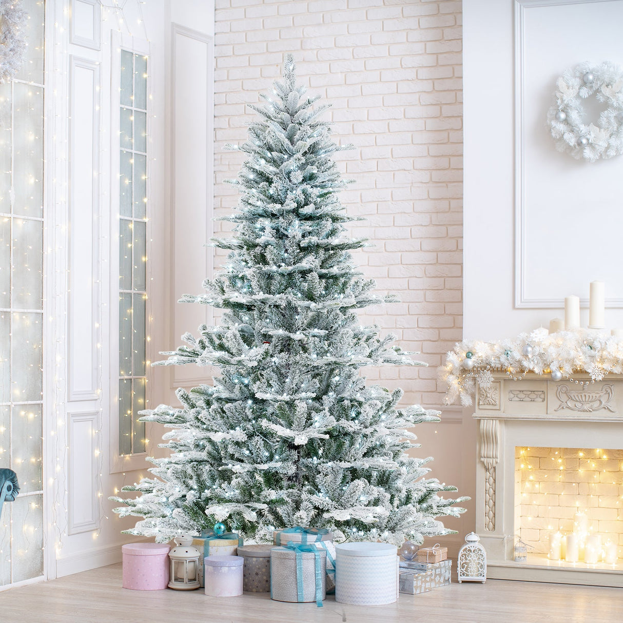 Árbol de Navidad artificial de 7 pies con nieve y luces LED blanco frío