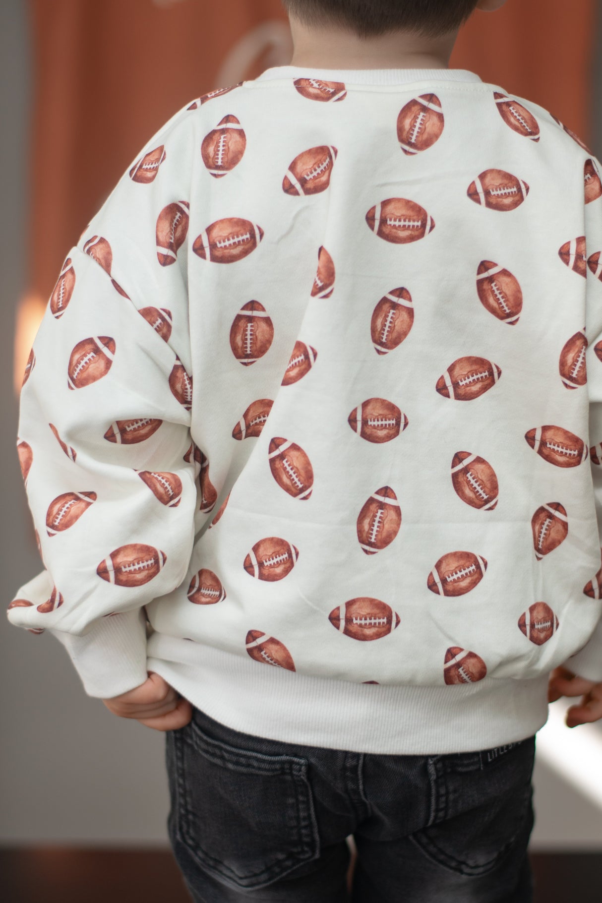 Sudadera con cuello redondo y estampado de fútbol americano