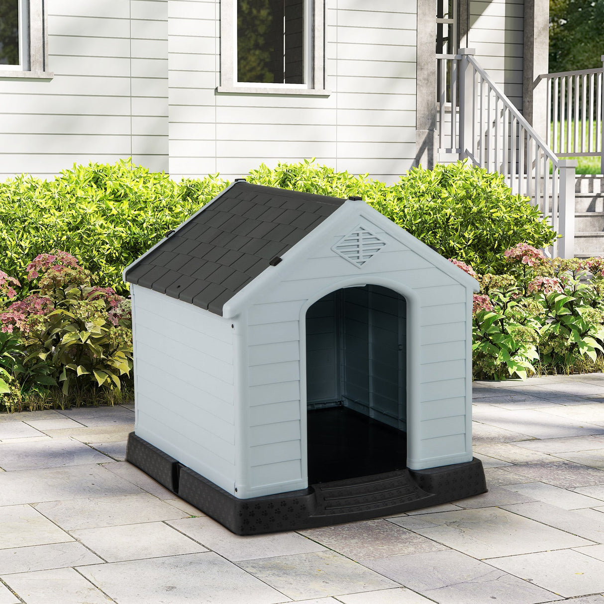 Caseta para perros pequeños de plástico impermeable con suelo elevado