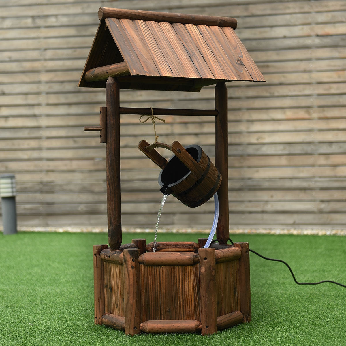 Fuente de agua de madera rústica decorativa para jardín con bomba