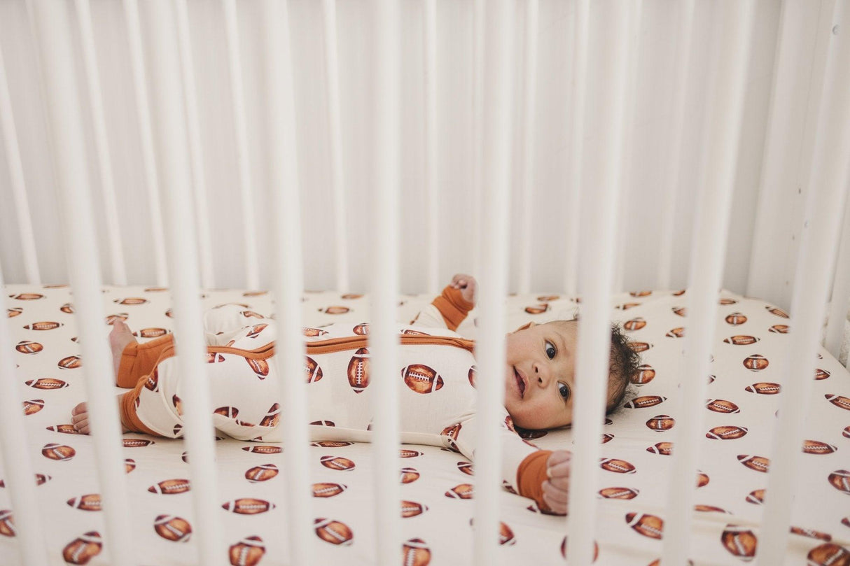 Pelele de bambú con cremallera y estampado de fútbol