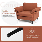 Sillón moderno de tela con muelles distribuidos originales y cojines en los reposabrazos