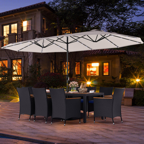 Juego de comedor de patio de 11 piezas con sombrilla LED para patio con base y cojines de asiento (azul marino)