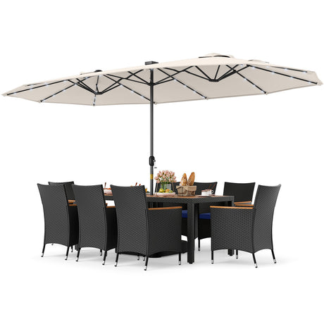 Juego de comedor de patio de 11 piezas con sombrilla LED para patio con base y cojines de asiento (azul marino)