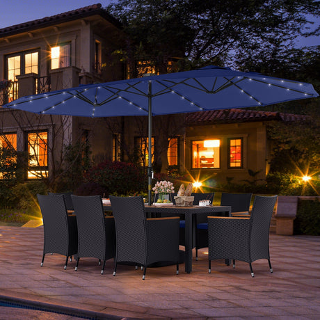 Juego de comedor de patio de 11 piezas con sombrilla LED para patio con base y cojines de asiento (azul marino)