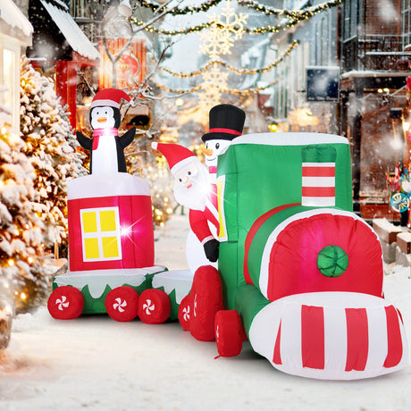 Tren inflable navideño de 11.5 FT Santa Claus conduciendo el tren