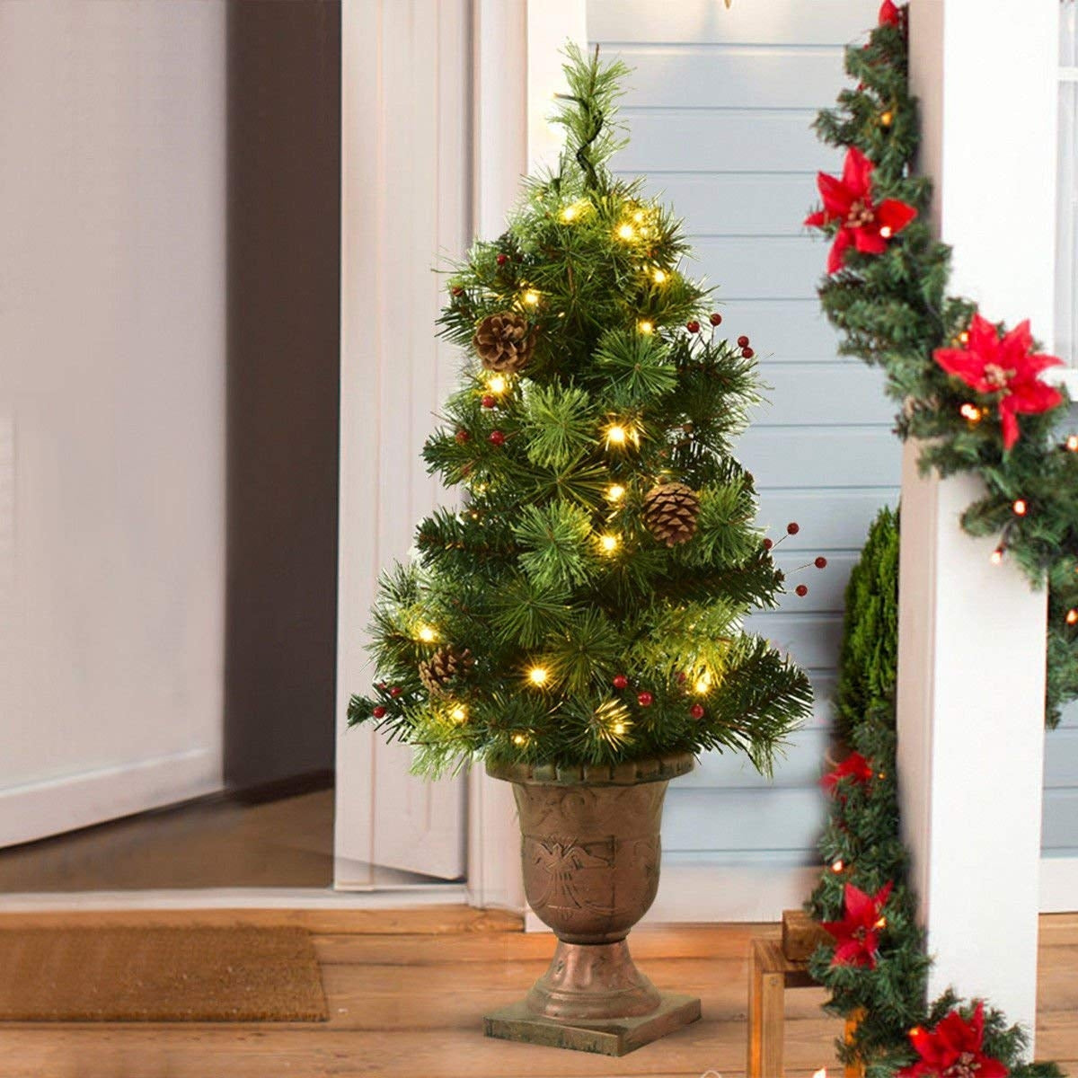 Árbol de Navidad LED con bayas rojas y piñas