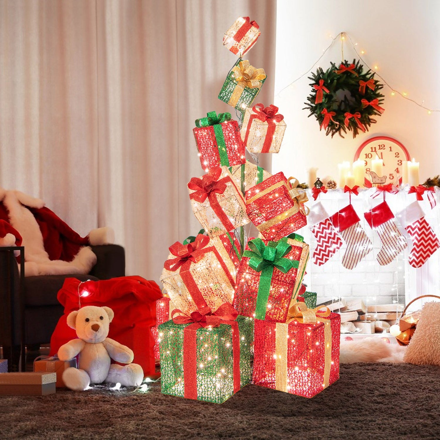Torre de 15 cajas de regalo de Navidad apiladas con luces y 450 luces LED blancas cálidas