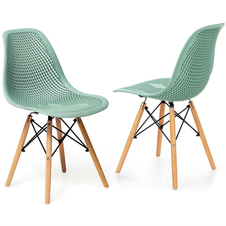 Juego de 2 sillas modernas de plástico huecas con patas de madera