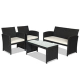 Juego de muebles de patio de ratán de 4 piezas con cojines resistentes a la intemperie y mesa de vidrio templado
