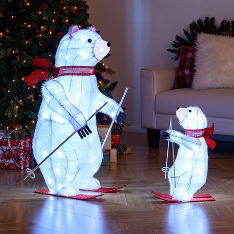 2 osos polares animados esquiando con luces y movimiento para decoración navideña