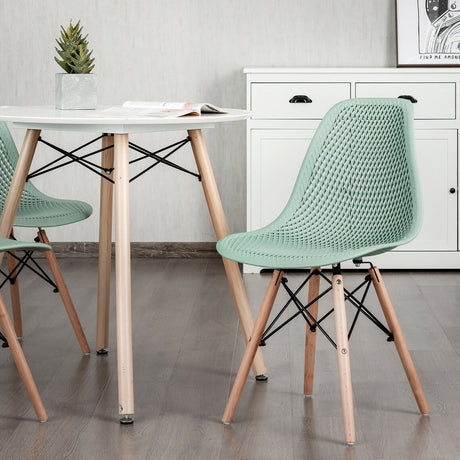 Juego de 2 sillas modernas de plástico huecas con patas de madera