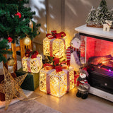 Set de 3 decoraciones de cajas de regalo navideñas iluminadas con lazos rojos