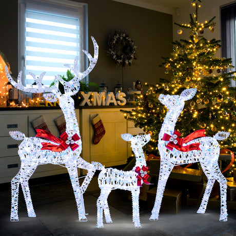Juego de 3 renos iridiscentes iluminados de Navidad con 215 luces LED blancas frías y estacas de tierra