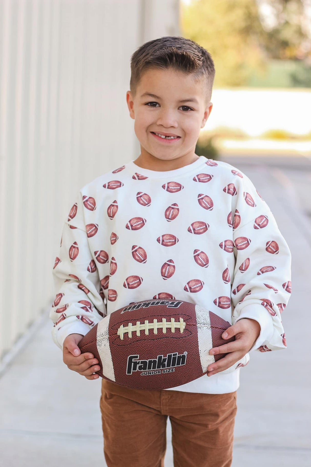 Sudadera con cuello redondo y estampado de fútbol americano