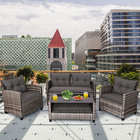 Juego de muebles de patio de ratán de 4 piezas con mesa de centro y sofá acolchado - Gris