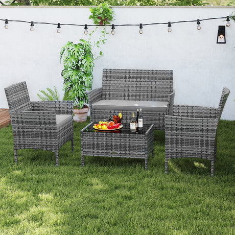 Juego de conversación de ratán para patio de 4 piezas con mesa de centro de vidrio templado