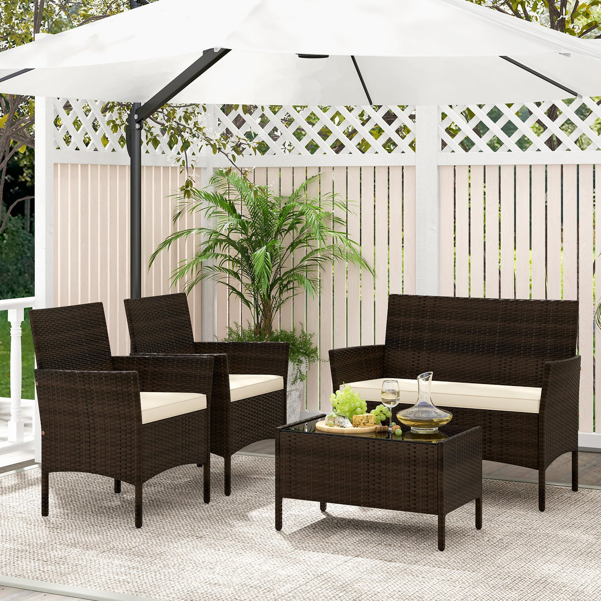 Juego de muebles de ratán de 4 piezas para patio con cómodos cojines