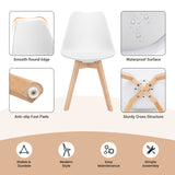 Juego de 4 sillas de comedor modernas de mediados de siglo con asiento de PU de carcasa y patas de madera
