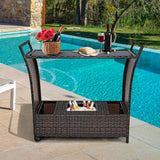 Carrito de bar de ratán para patio con superficie de cristal y asa
