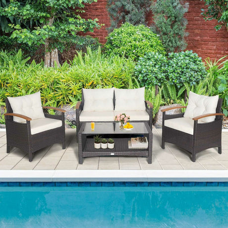 Juego de muebles de patio de ratán de 4 piezas con sofá acolchado y mesa de almacenamiento