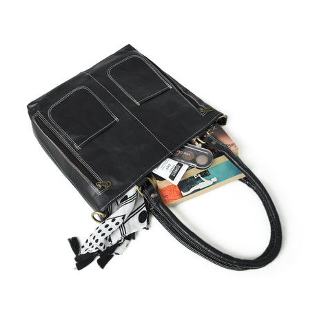 Bolso de mano negro de rizo