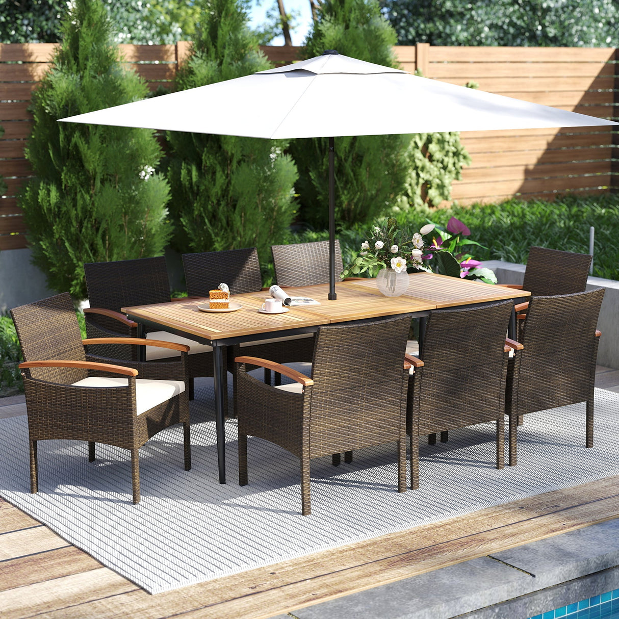 Juego de comedor de mimbre de PE para patio de 9 piezas con cojines y orificio para sombrilla