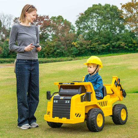 Camión volquete para niños de 12 V con licencia Caterpillar con cama basculante, color amarillo