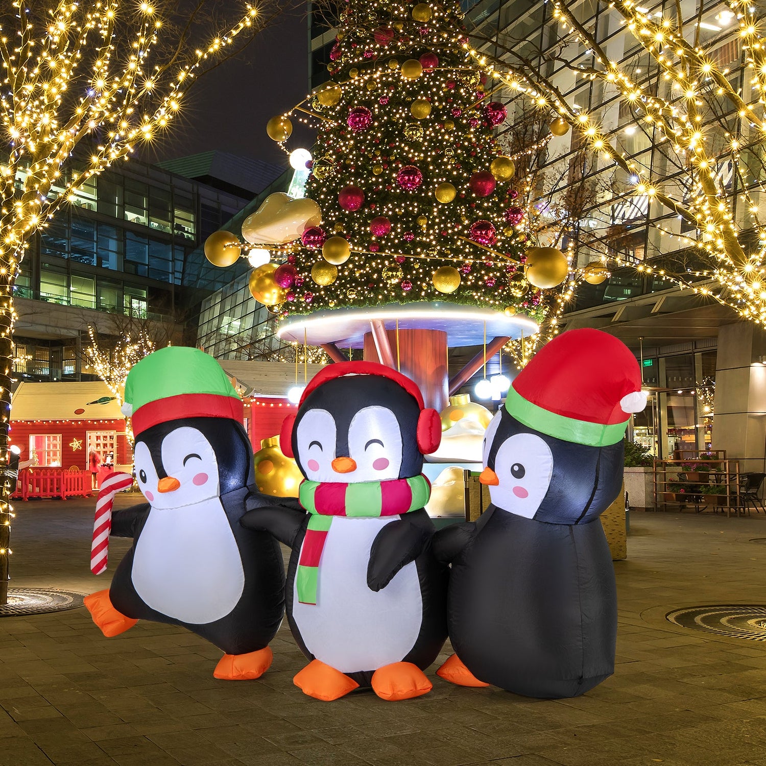 Familia de pingüinos inflables de Navidad con luces LED incorporadas