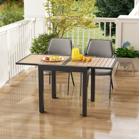 Mesa de patio extensible de 31.5-63 pulgadas para 4-6 personas - Natural