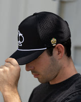 Gorra perforada con cuerda - Negra