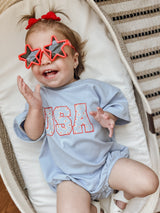 Romper tipo camiseta holgada Daisy de EE. UU.
