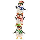 Decoración de pingüinos iluminados con luces blancas cálidas y sombreros bonitos