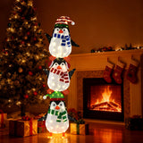 Decoración de pingüinos iluminados con luces blancas cálidas y sombreros bonitos