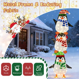 Decoración de pingüinos iluminados con luces blancas cálidas y sombreros bonitos