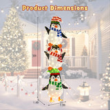 Decoración de pingüinos iluminados con luces blancas cálidas y sombreros bonitos