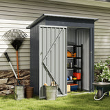 Cobertizo de almacenamiento exterior de 1,5 x 0,9 metros con techo inclinado y puerta con cerradura - Gris