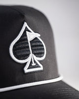 Gorra perforada con cuerda - Negra