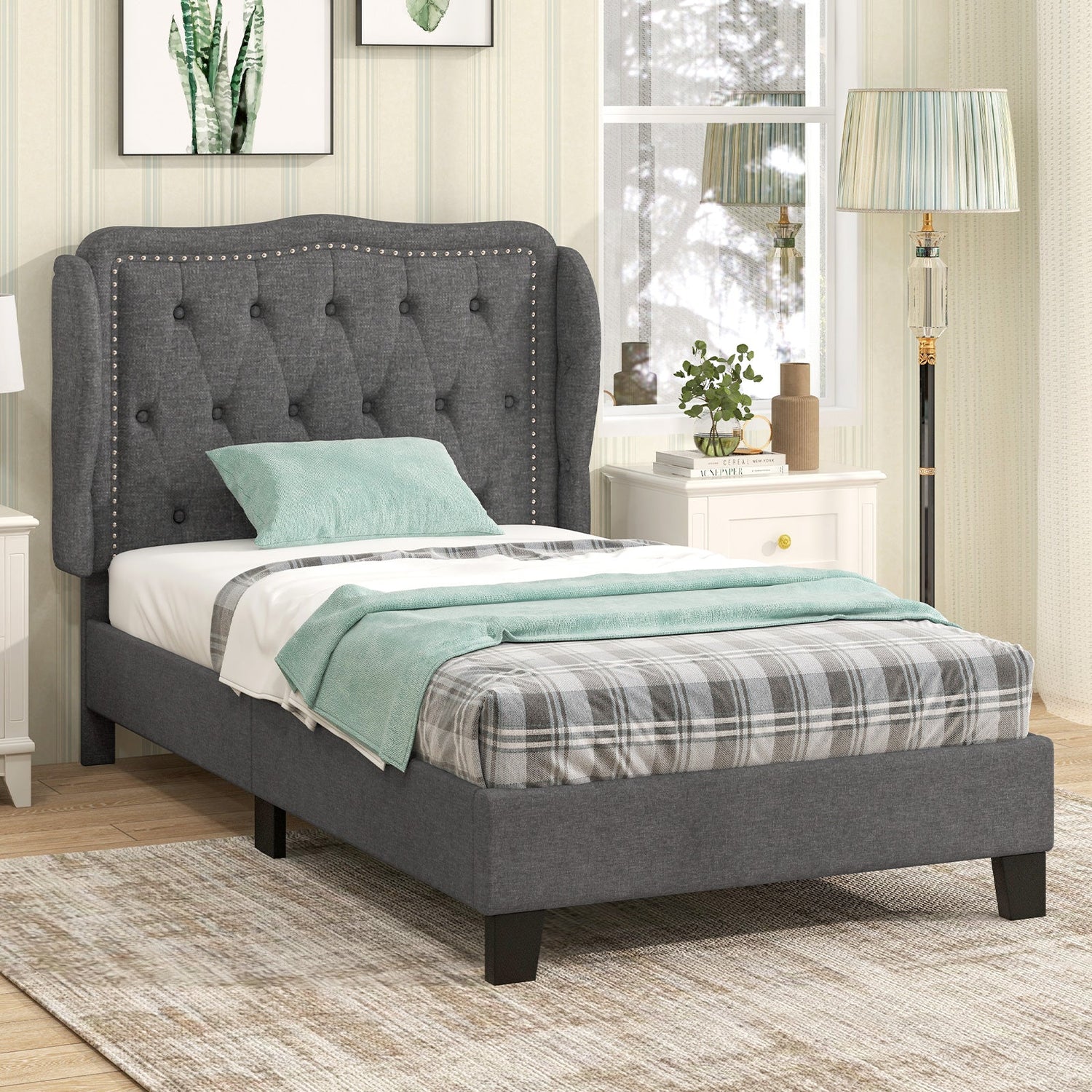 Estructura de cama individual con cabecero tapizado con botones y respaldo de ala, y espacio de almacenamiento - Gris