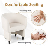 Sillón de terciopelo tapizado con otomana