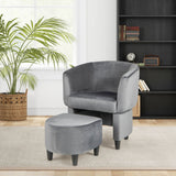 Sillón de terciopelo tapizado con otomana
