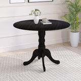 Mesa de comedor de madera con tablero redondo y patas de caballete curvadas
