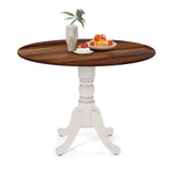Mesa de comedor de madera con tablero redondo y patas de caballete curvadas
