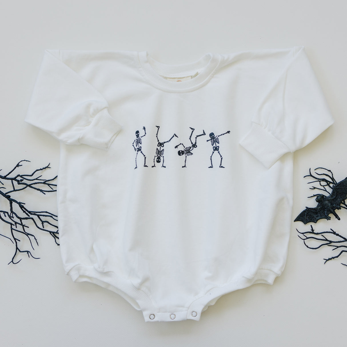 Mameluco de sudadera con esqueletos bailarines - Blanco