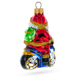 Santa on Motorcycle with Green Backpack Glass Christmas Ornament