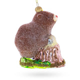 Beaver Holding a Log Glass Christmas Ornament