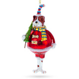 Dog in Fur Hat Holding Tree Glass Christmas Ornament